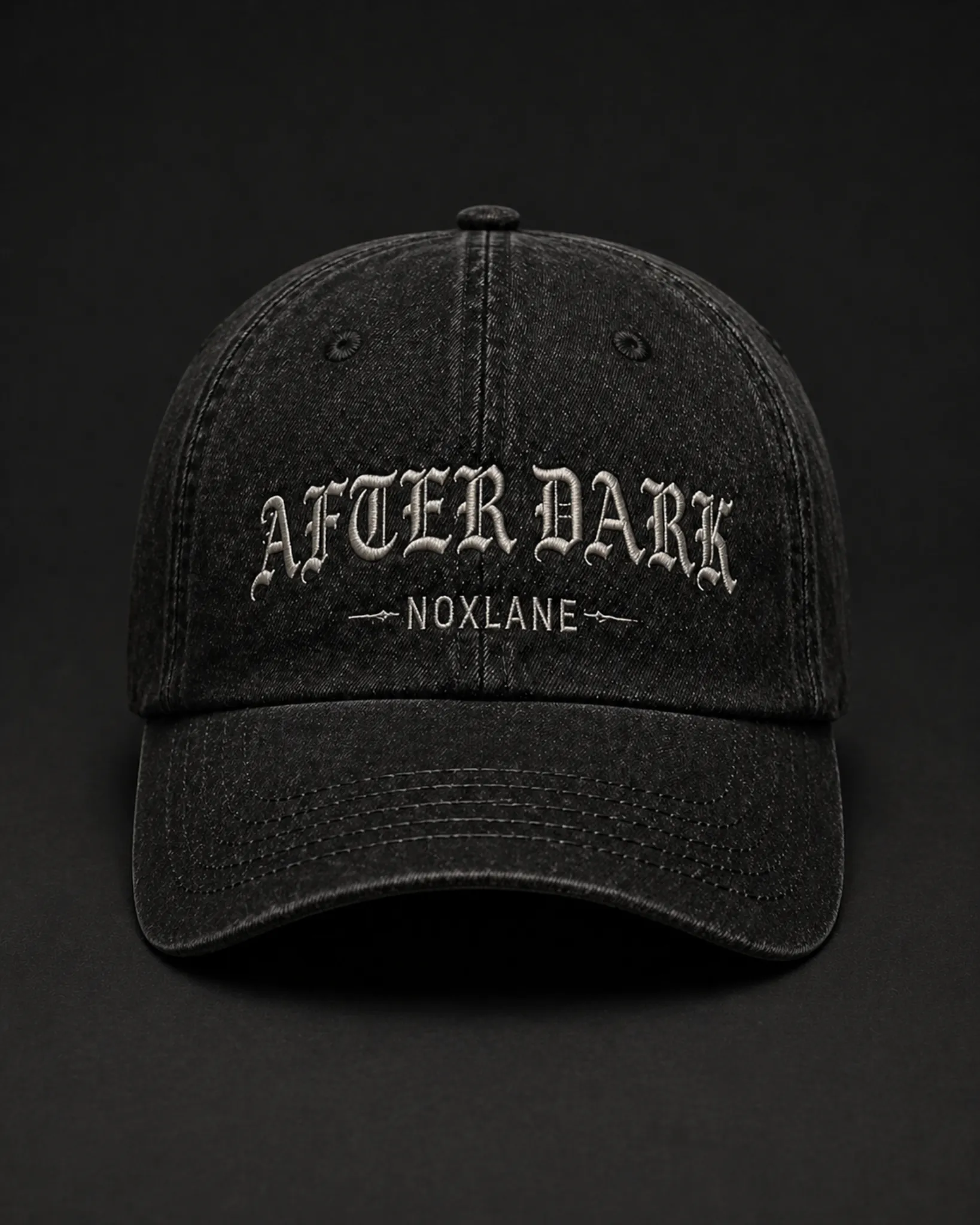 AFTER DARK CAP — washed black cotton twill cap with stacked gothic lettering
