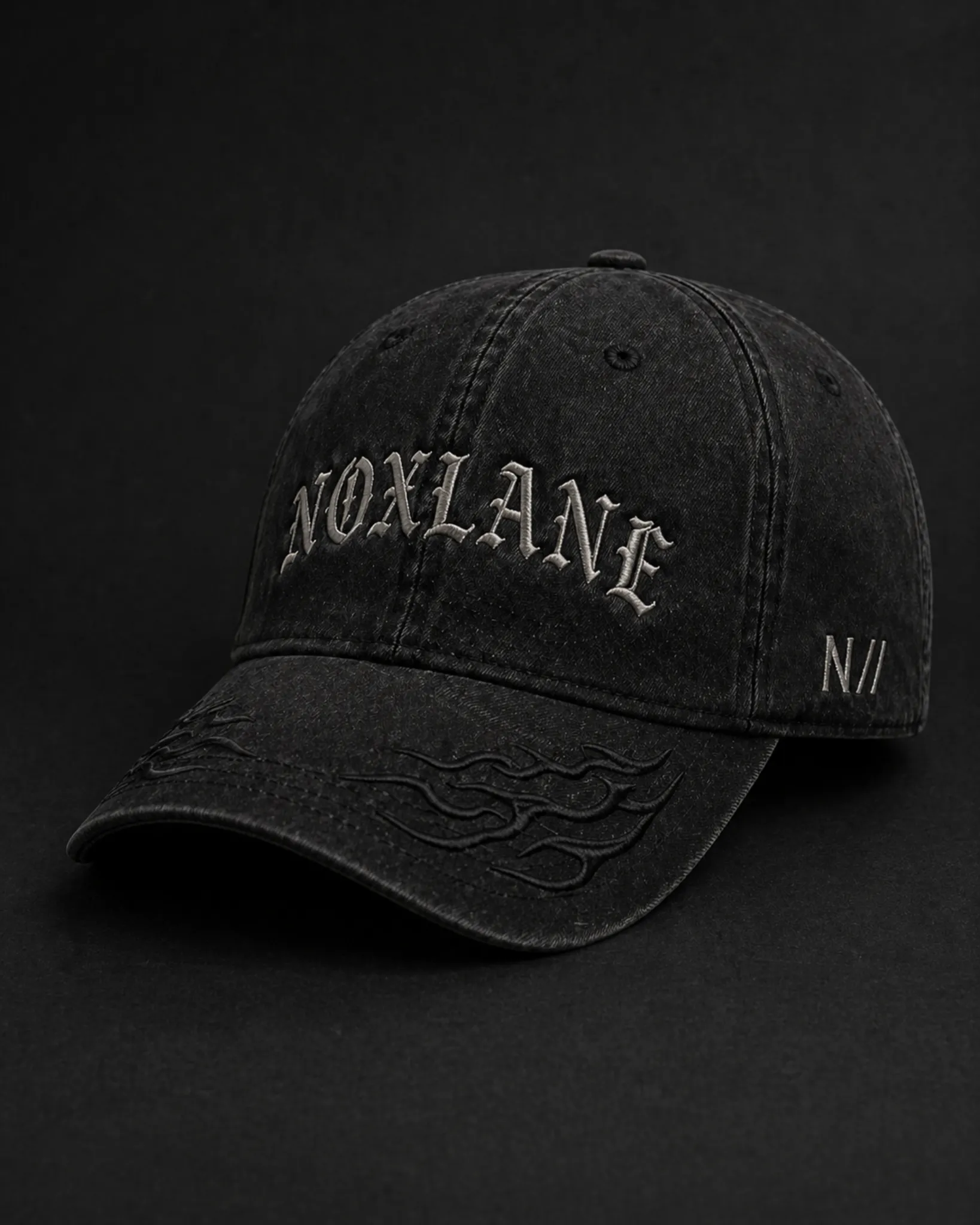 VOID LANE CAP — washed black cotton twill cap with gothic NOXLANE embroidery